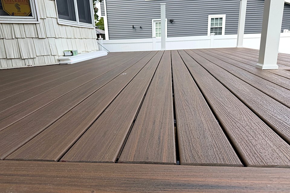 Close view of the new two-tone composite porch decking