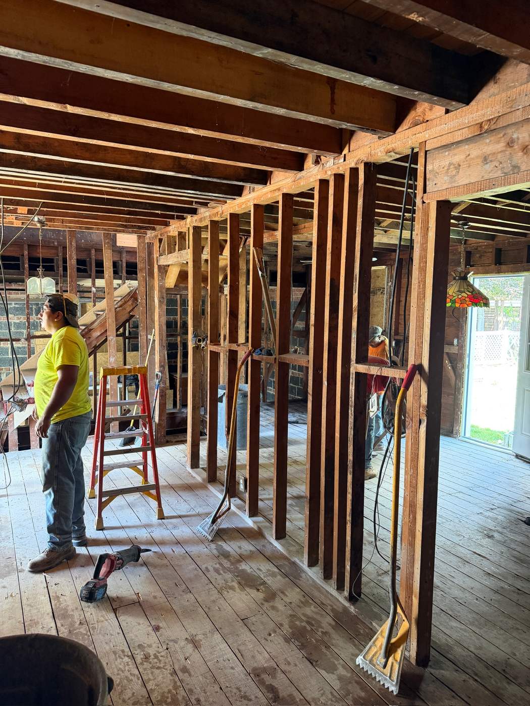 Crew in the gutted house