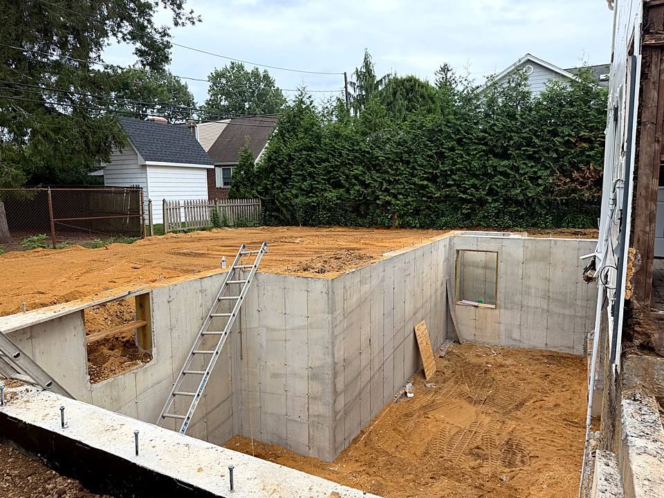 Addition foundation: New poured foundation walls for the rear addition.