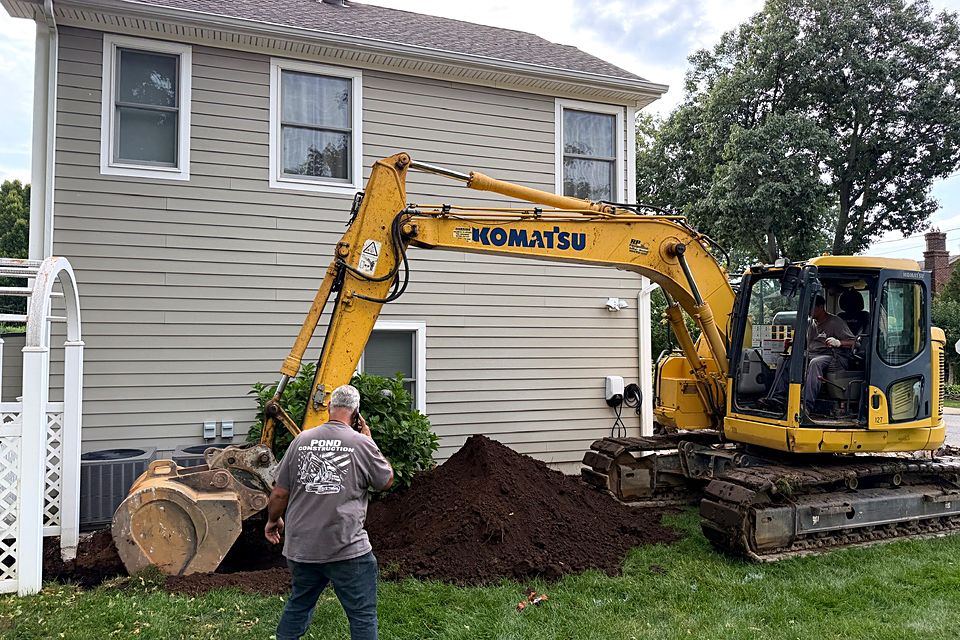 Excavator and crew