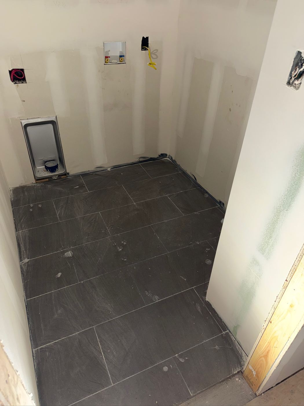 Laundry floor tiled