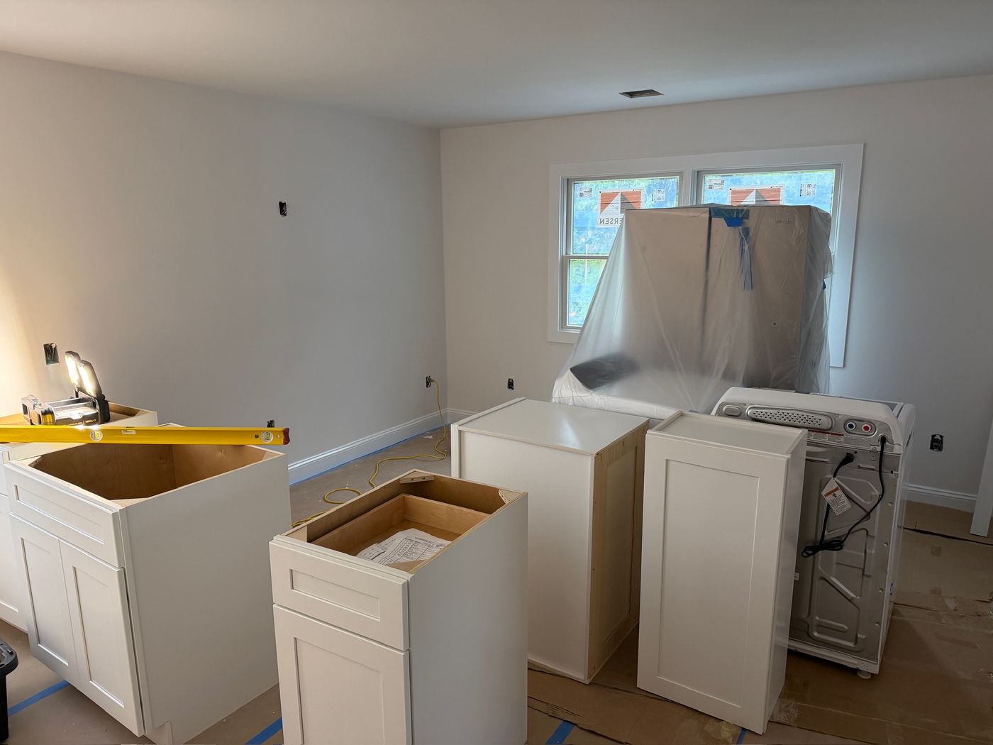 Cabinets going in