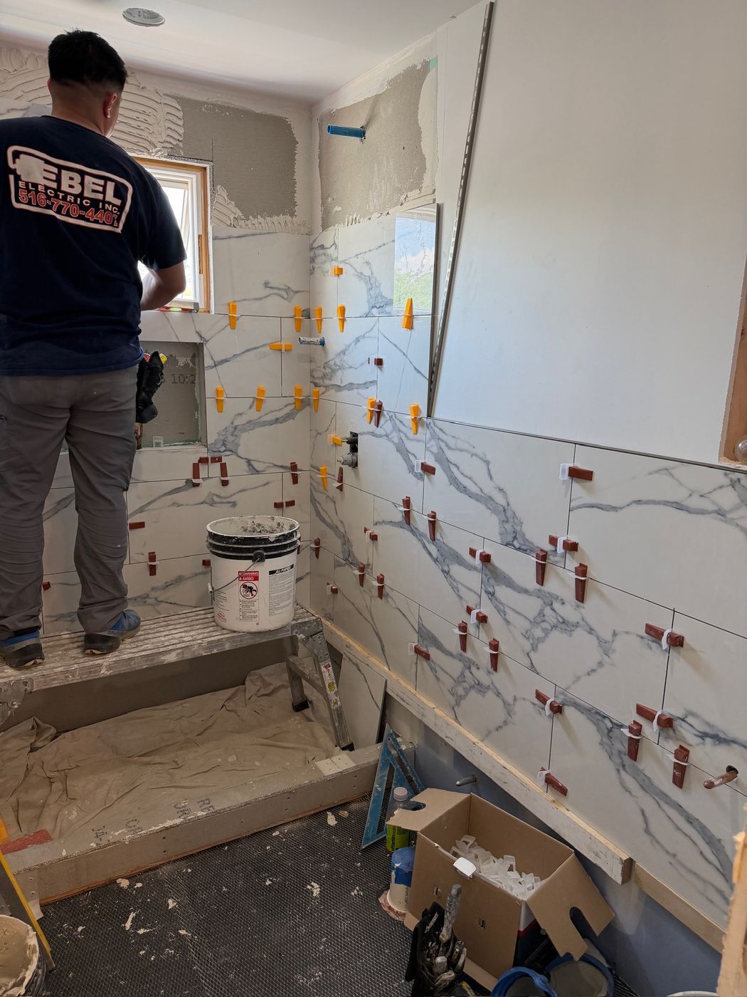 Setting shower tile