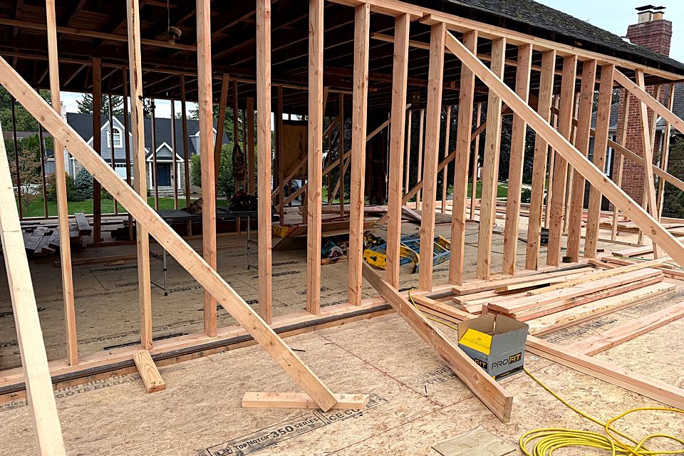 Newly framed walls braced in place on the subfloor