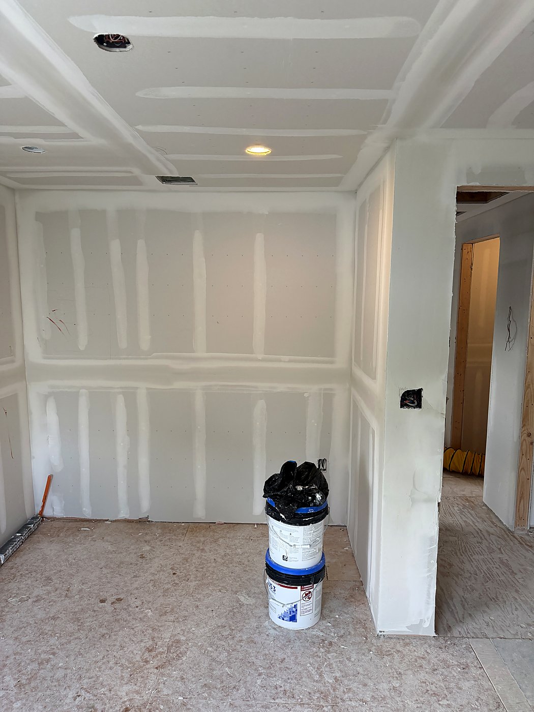 Finished drywall in the bedroom ready for paint