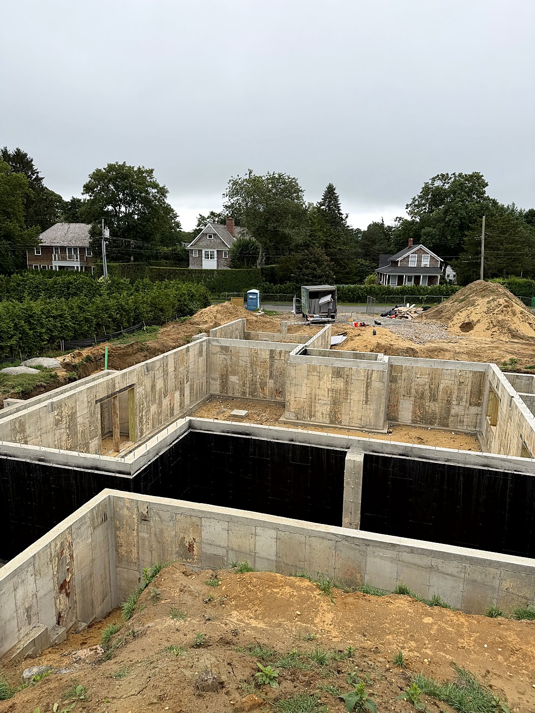 Poured concrete foundation walls of a new custom home