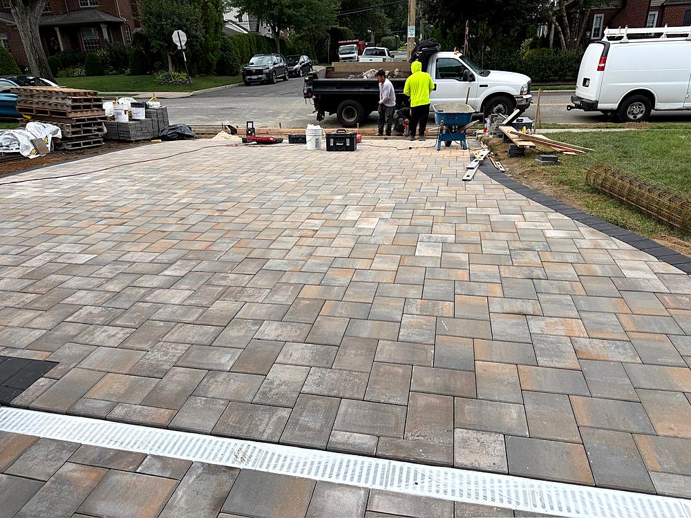 Finished paver driveway laid in a running bond pattern
