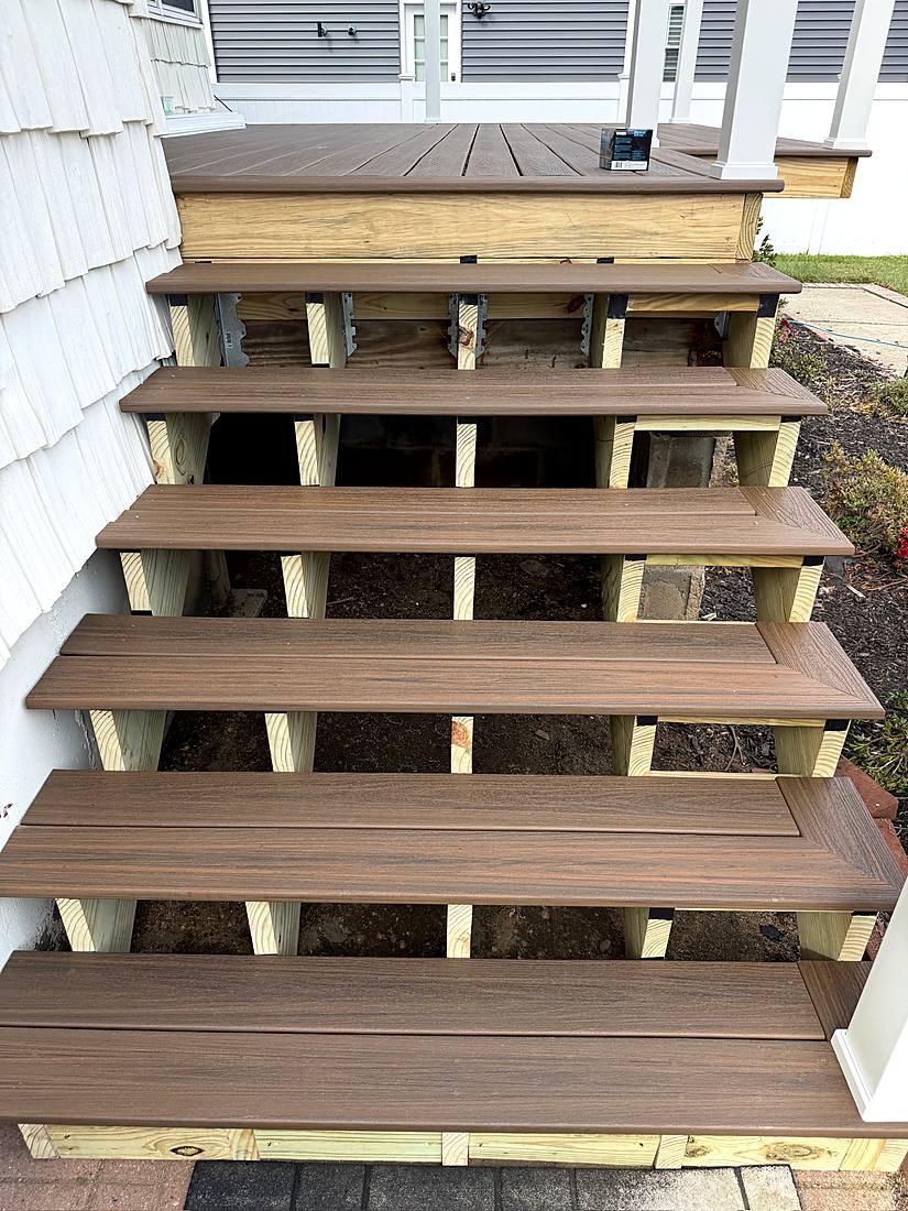 Finished composite porch steps with a contrasting border