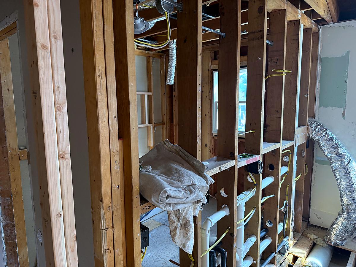 New framing with ductwork and mechanicals run through the renovation
